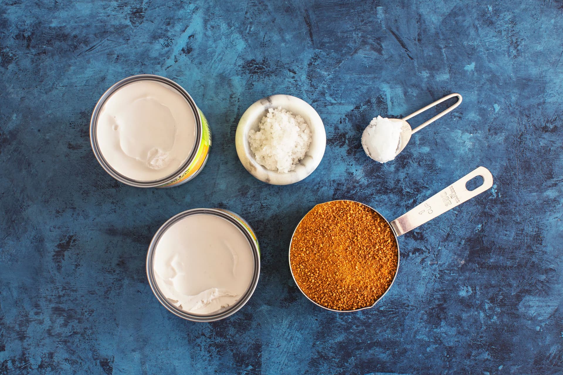 Ingredients for vegan coconut salted caramel: coconut milk, coconut sugar, coconut oil and coarse salt.