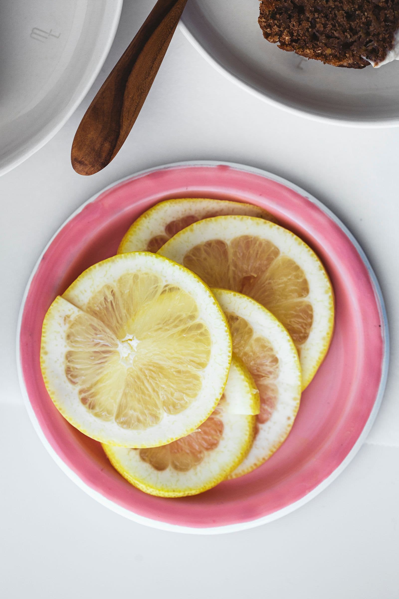 Close view of lemon slices used to decorate the zucchini cake.